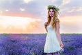 Beautiful Girl in lavender Field at sunset Royalty Free Stock Photo