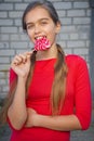 Beautiful girl with lollipop.