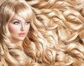 Beautiful girl with long curly blond hair Royalty Free Stock Photo