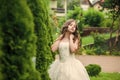 Beautiful girl long curly hair wearing white dress, wedding fashion collection concept Royalty Free Stock Photo