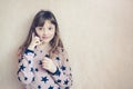 Little girl is talking on a mobile phone. Royalty Free Stock Photo