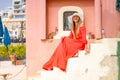 Beautiful girl in a long red dressBeautiful girl in a long red dress Royalty Free Stock Photo