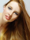 The beautiful girl with long red hair Royalty Free Stock Photo