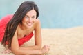 Beautiful girl lying on a beach and smiling Royalty Free Stock Photo