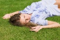 Beautiful girl lying down of grass Royalty Free Stock Photo