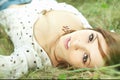 Beautiful girl lying down of grass Royalty Free Stock Photo