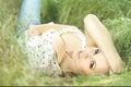 Beautiful girl lying down of grass Royalty Free Stock Photo