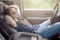 Beautiful girl lying on the front seat Royalty Free Stock Photo