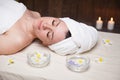 The beautiful girl lying in Spa massage sauna Royalty Free Stock Photo