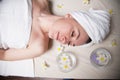 The beautiful girl lying in Spa massage sauna Royalty Free Stock Photo