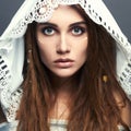 Beautiful girl with make-up,dreadlocks and lace shawl Royalty Free Stock Photo