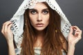 Beautiful girl with make-up,dreadlocks and lace shawl Royalty Free Stock Photo