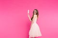 Beautiful girl with marshmallow candy on stick. Royalty Free Stock Photo