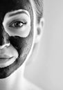 Beautiful girl with mask from clay on his face. Cosmetic mask. Beauty face. Beauty wellness concept. Royalty Free Stock Photo