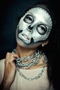 Beautiful girl model with black body with silver mask Royalty Free Stock Photo