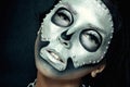 Beautiful girl model with black body with silver mask Royalty Free Stock Photo