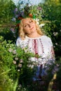 Beautiful girl in national Ukrainian embroidery shirt and wreat Royalty Free Stock Photo