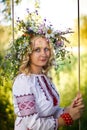 Beautiful girl in national Ukrainian embroidery shirt and wreat Royalty Free Stock Photo