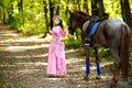 Woman near horse Royalty Free Stock Photo