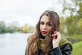 Beautiful girl outdoor. Young woman in autumn park Royalty Free Stock Photo