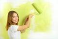 Beautiful girl painting a wall Royalty Free Stock Photo