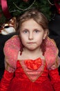 Beautiful girl in the photo studio on textured background