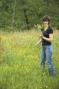 Beautiful girl picking flowers Royalty Free Stock Photo