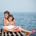 Beautiful Girl on The Pier. Sea