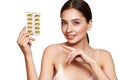 Beautiful Girl With Pill With Cod Liver Oil Omega-3 Royalty Free Stock Photo