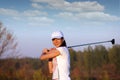 Beautiful girl play golf Royalty Free Stock Photo