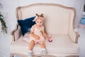 Beautiful girl playing with cupcake. Birthday baby. Model, happy. Little girl with cake. Childhood. Little child girl in a Royalty Free Stock Photo