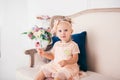 Beautiful girl playing with cupcake. Birthday baby. Model, happy. Little girl with cake. Childhood. Little child girl in a Royalty Free Stock Photo