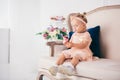 Beautiful girl playing with cupcake. Birthday baby. Model, happy. Little girl with cake. Childhood. Little child girl in a Royalty Free Stock Photo