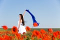 Beautiful girl in the poppy field Royalty Free Stock Photo