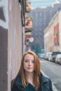 Beautiful girl posing in the city streets