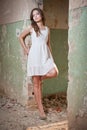 Beautiful girl posing fashion near an old wall Royalty Free Stock Photo