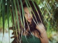 Beautiful girl posing in tropical forest. Close-up perfect portrait Royalty Free Stock Photo