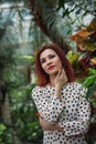 Beautiful girl posing in tropical forest. Close-up of sensual young woman wearing in dress. Royalty Free Stock Photo