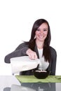 Beautiful Girl Pouring Milk to her Cereal Royalty Free Stock Photo
