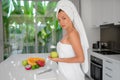 Beautiful girl preparing a healthy breakfast of fruit in the morning Royalty Free Stock Photo