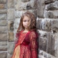 Beautiful girl in a princess red dress posing Royalty Free Stock Photo