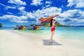 Beautiful girl in red bikini on beach, Poda island in Thailand.