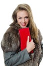 The beautiful girl with red handbag Royalty Free Stock Photo