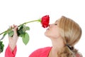 Beautiful girl with a red rose. Royalty Free Stock Photo