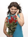 Beautiful girl with red roses