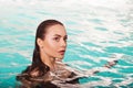 Beautiful girl is relaxing in the Spa pool, relaxing and taking care of herself. Royalty Free Stock Photo