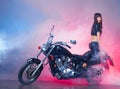 Beautiful girl on a retro motorcycle Royalty Free Stock Photo