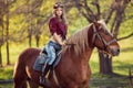 Beautiful girl riding horse on autumn field Royalty Free Stock Photo