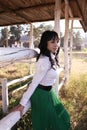 Beautiful girl and the rural landscape