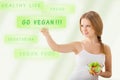 Beautiful girl with a salad choose vegetarianism Royalty Free Stock Photo